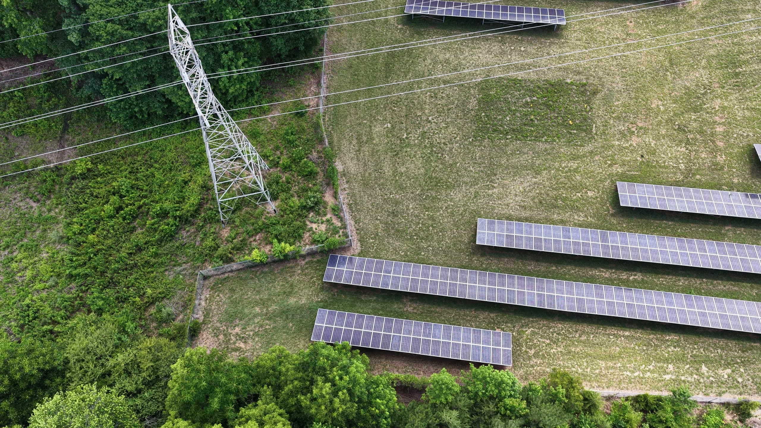 Steel lattice transmission tower detected on a site boundary